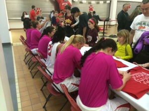 The team signed posters and shirts for fans after the game. 