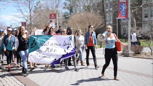 Groups of students marched on Wed. April 14 at the academic mall to protest against sexual violence in the “Walk in their Shoes,” event. Photo by Bridget Downes (April 14, 2015).
